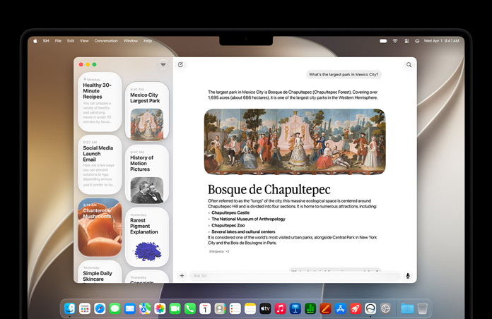 14-tommers MacBook Pro i fargen stellarsvart. På skjermen vises Siri-appen med en aktiv Siri AI-samtale og tidligere samtaler i sidepanelet.